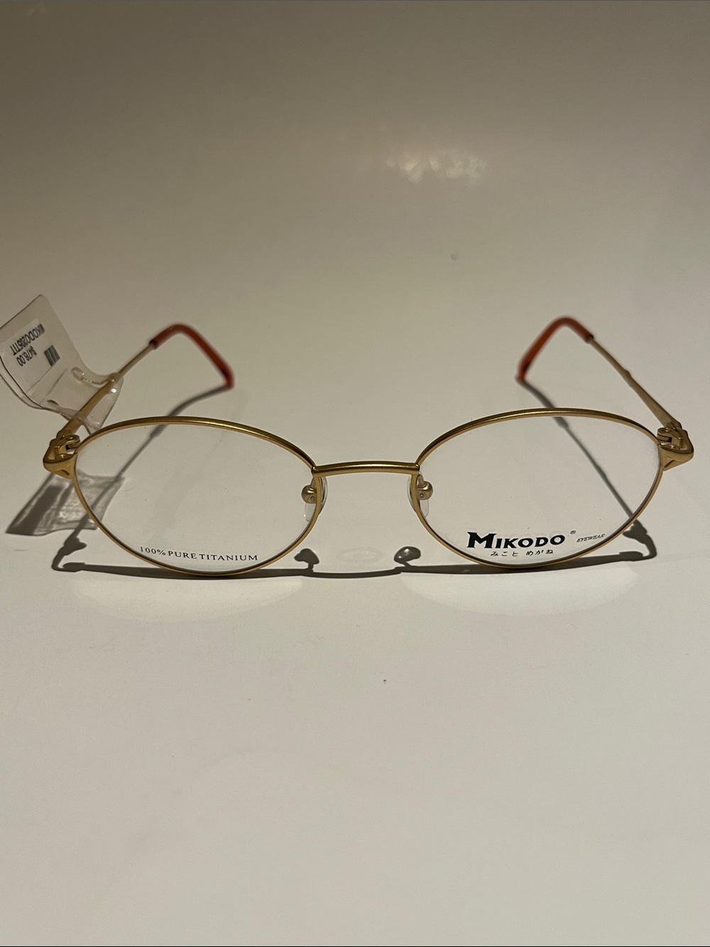 Women's Gold Oval Titanium Eyeglasses